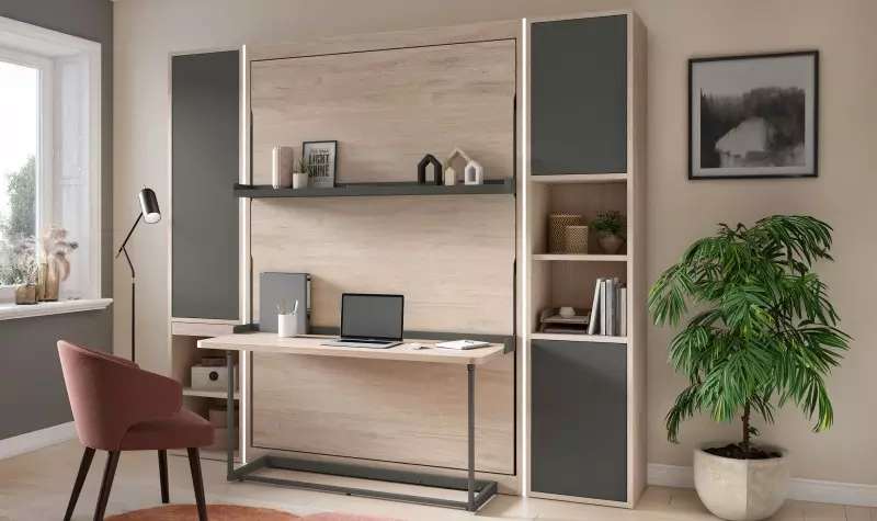 Pièce multifonction avec bureau et lit rabattable pour aménager un studio